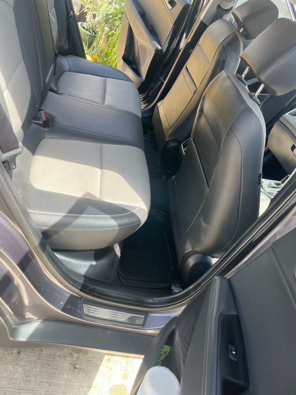 Car back-seat footwells and mats — after cleaning