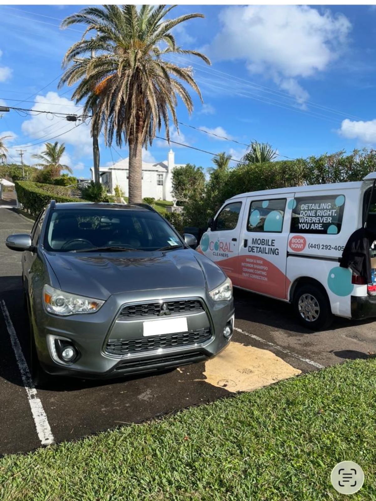 Detailed SUV parked beside the Coral Cleaners mobile detailing van